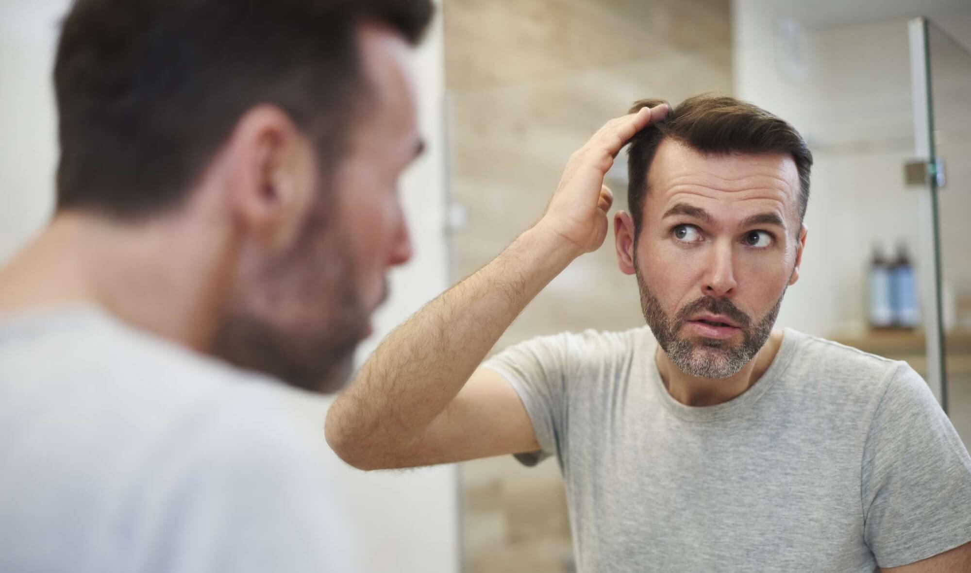 Was Männer über Minoxidil wissen müssen Minoxidil gegen Haarausfall - Leitfaden für Männer